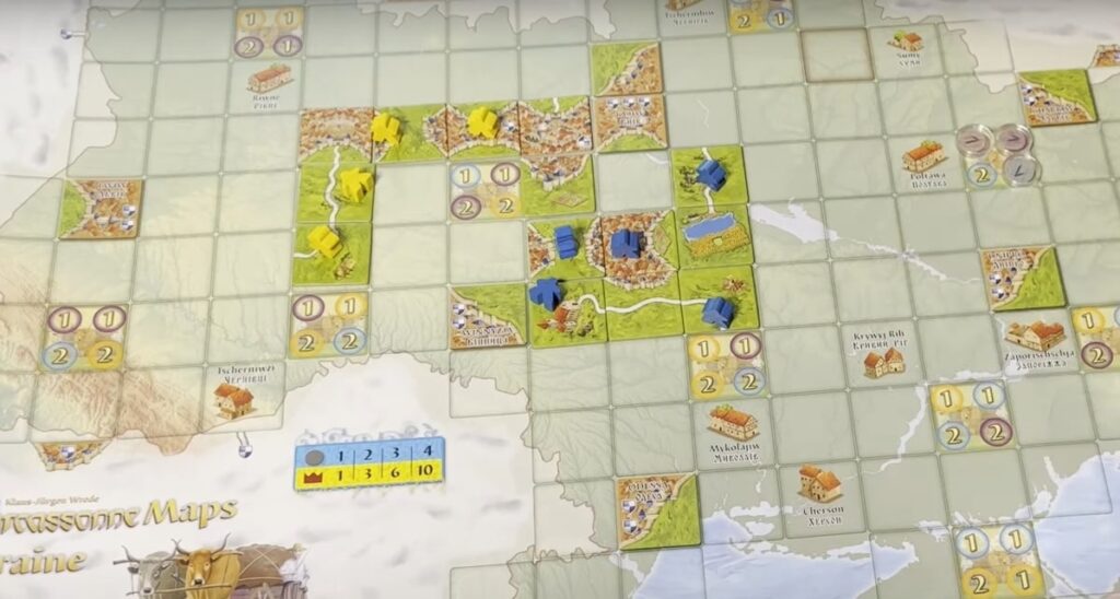 Carcassonne classic gameplay: board map, tiles and meeples