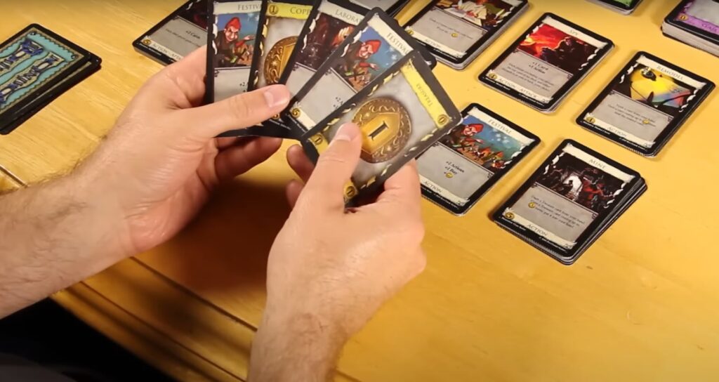Dominion cards on the table and in the hands