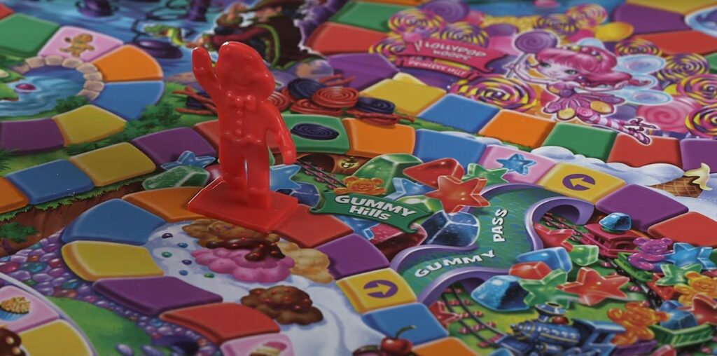 Candyland board game map with red token